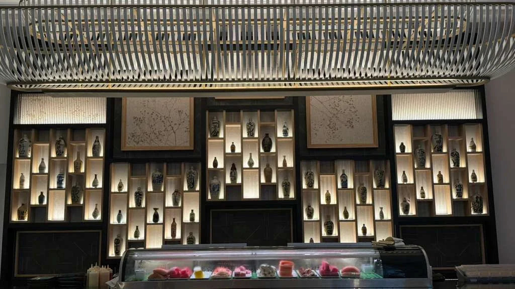 Display of 80 vintage Japanese sake bottles supplied by Chidori Vintage for The Ritz-Carlton Aruba restaurant