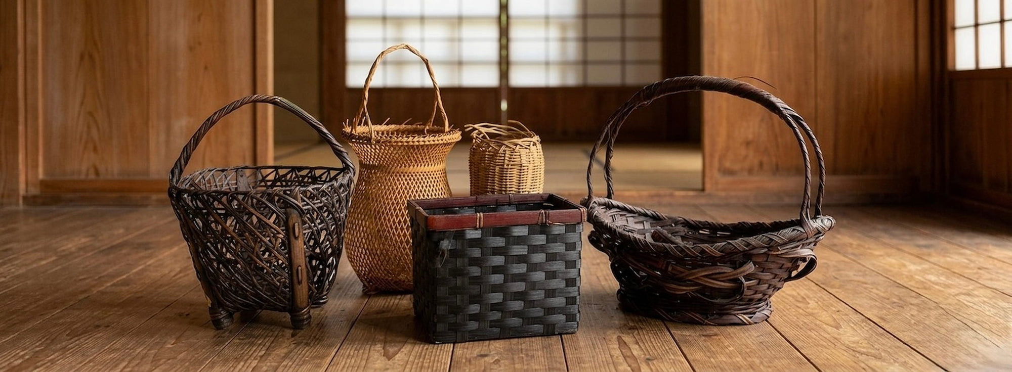 Collection of vintage Japanese bamboo baskets displayed in a traditional wooden Japanese interior with warm natural light