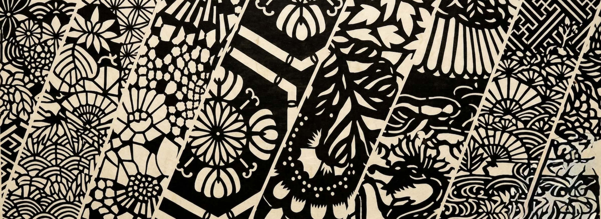 raditional Japanese Katagami stencil patterns featuring intricate hand-cut floral, geometric, and nature-inspired designs on antique paper