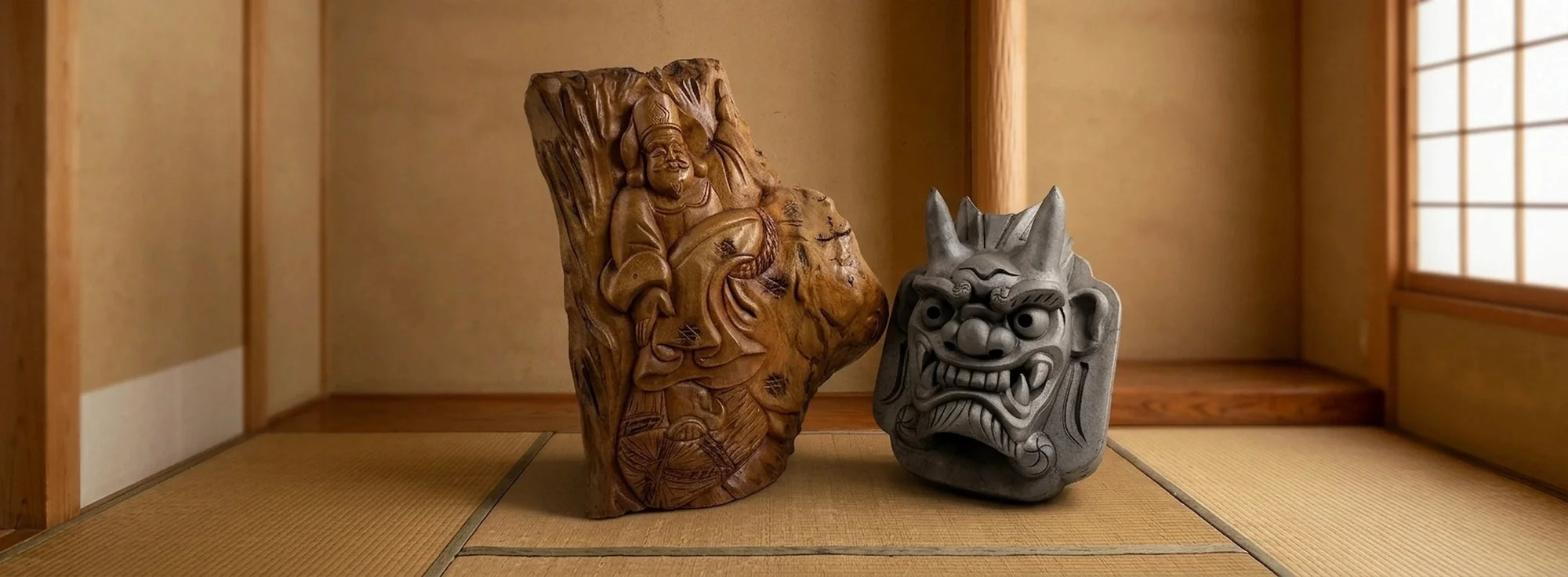 Collection of rare Japanese antiques including a hand-carved wooden Daikokuten sculpture and an antique oni roof tile displayed in a traditional Japanese room setting