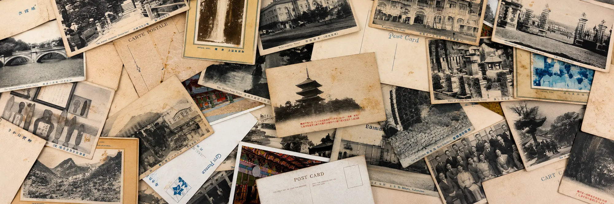 Collection of vintage Japanese postcards featuring historic landmarks, temples, cityscapes, and scenic views from early 20th century Japan