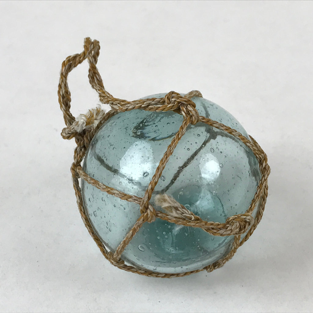 https://chidorivintage.com/cdn/shop/files/Japanese-Glass-Fishing-Float-Ukidama-Buoy-Ball-Vtg-Bindama-Rope-Small-Blue-GF11_1024x1024.jpg?v=1707075265