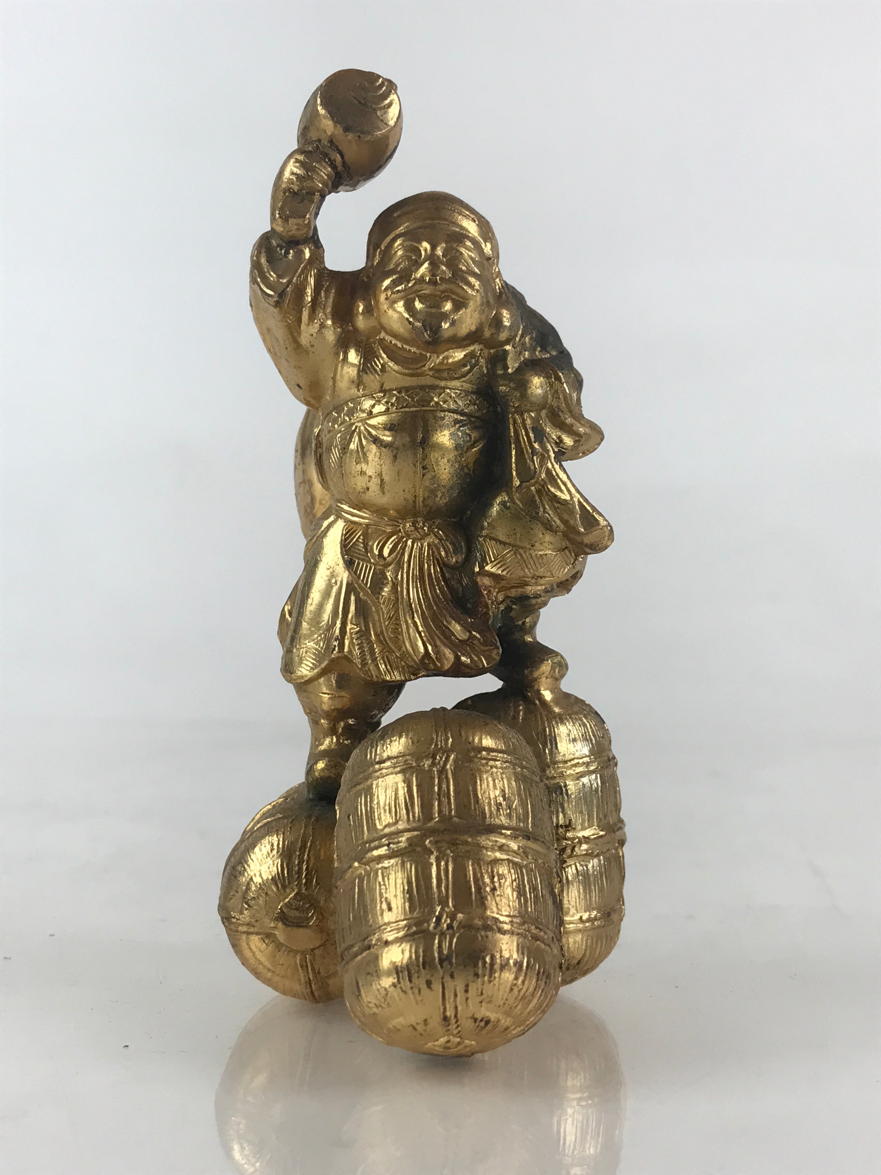 https://chidorivintage.com/cdn/shop/files/Japanese-Metal-Engraving-Small-Statue-Gold-Figurine-Vtg-7-Lucky-Gods-Daikokuten-2.jpg?v=1686078679