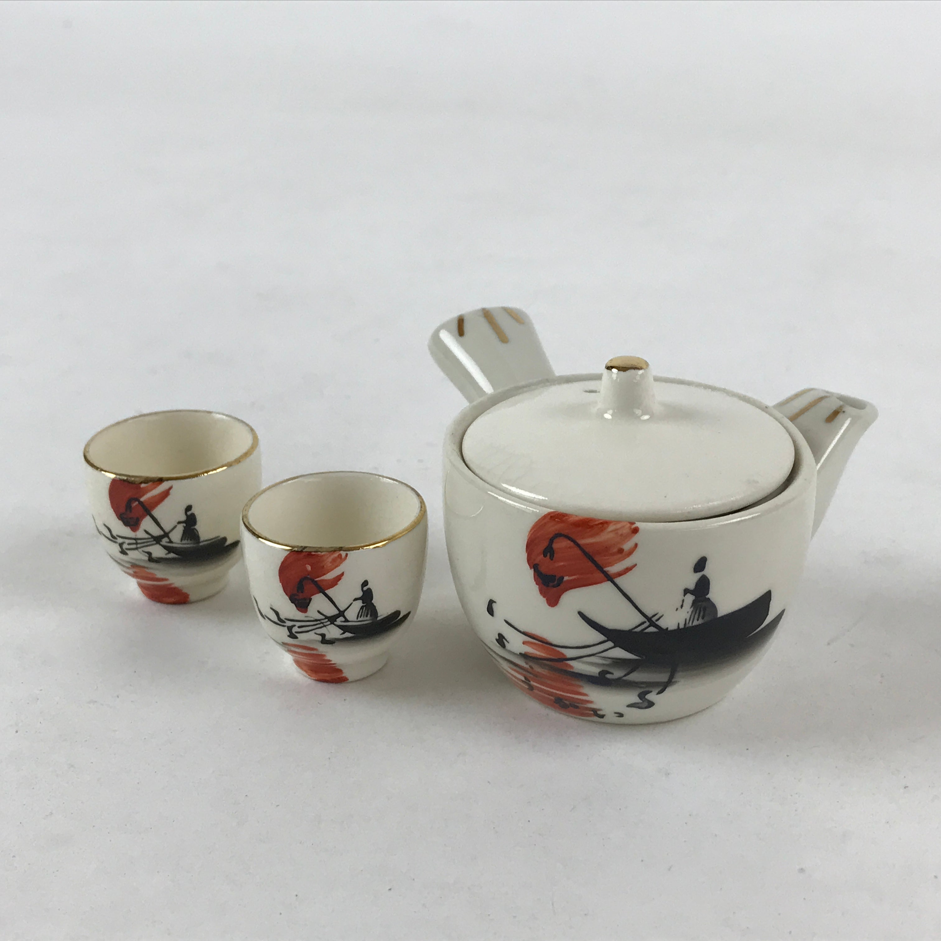 https://chidorivintage.com/cdn/shop/files/Japanese-Porcelain-Miniature-Tea-Set-Vtg-Kyusu-Yokode-Teapot-2-Cups-White-PY541.jpg?v=1697401413