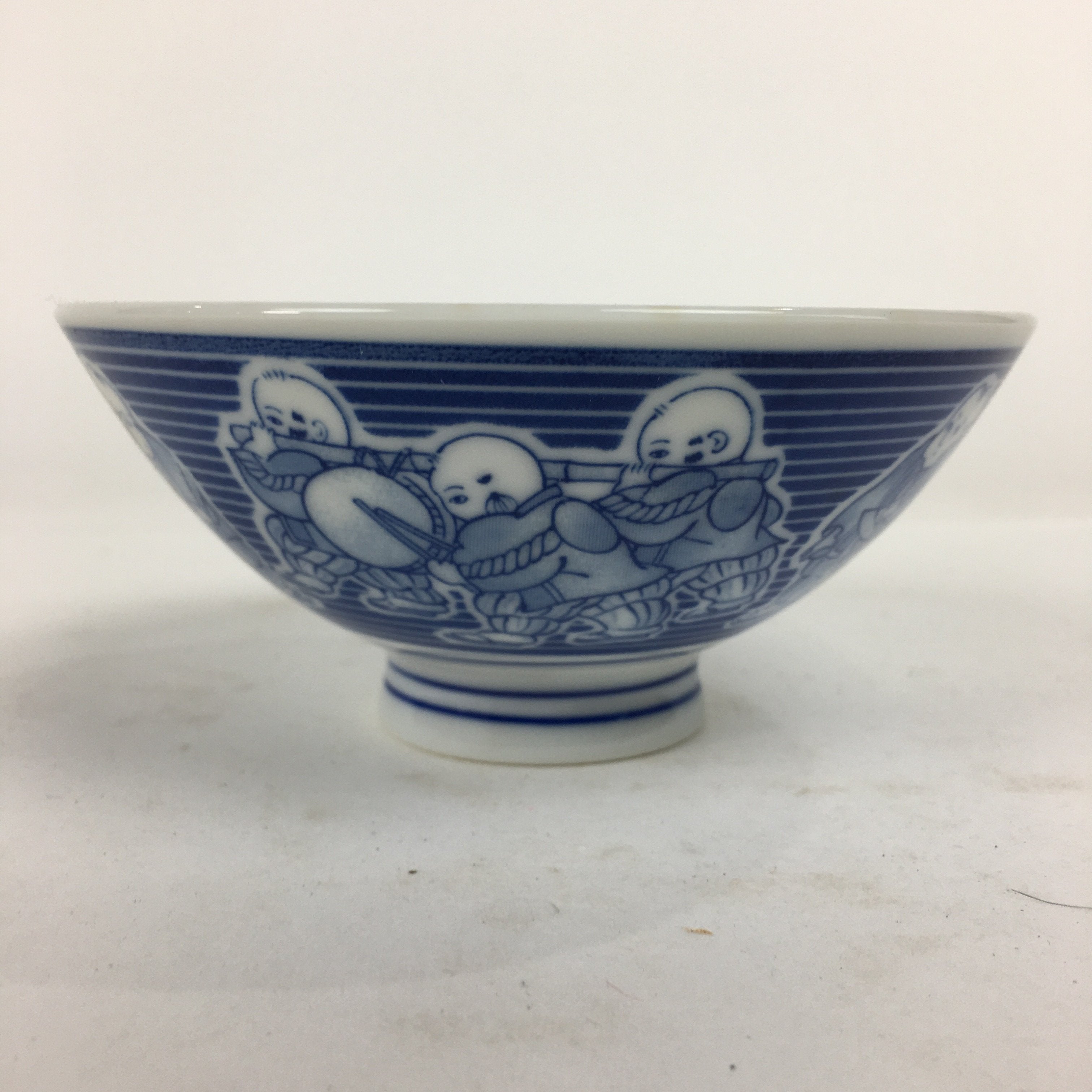 https://chidorivintage.com/cdn/shop/products/Japanese-Arita-Ware-Porcelain-Rice-Bowl-Vtg-Sometsuke-Blue-Kids-Festival-QT134.jpg?v=1637090440