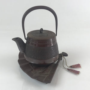 https://chidorivintage.com/cdn/shop/products/Japanese-Cast-Iron-Teapot-Tetsubin-Kettle-Trivet-Vtg-Nanbu-Tekki-Kyusu-T102_300x300.jpg?v=1664910946