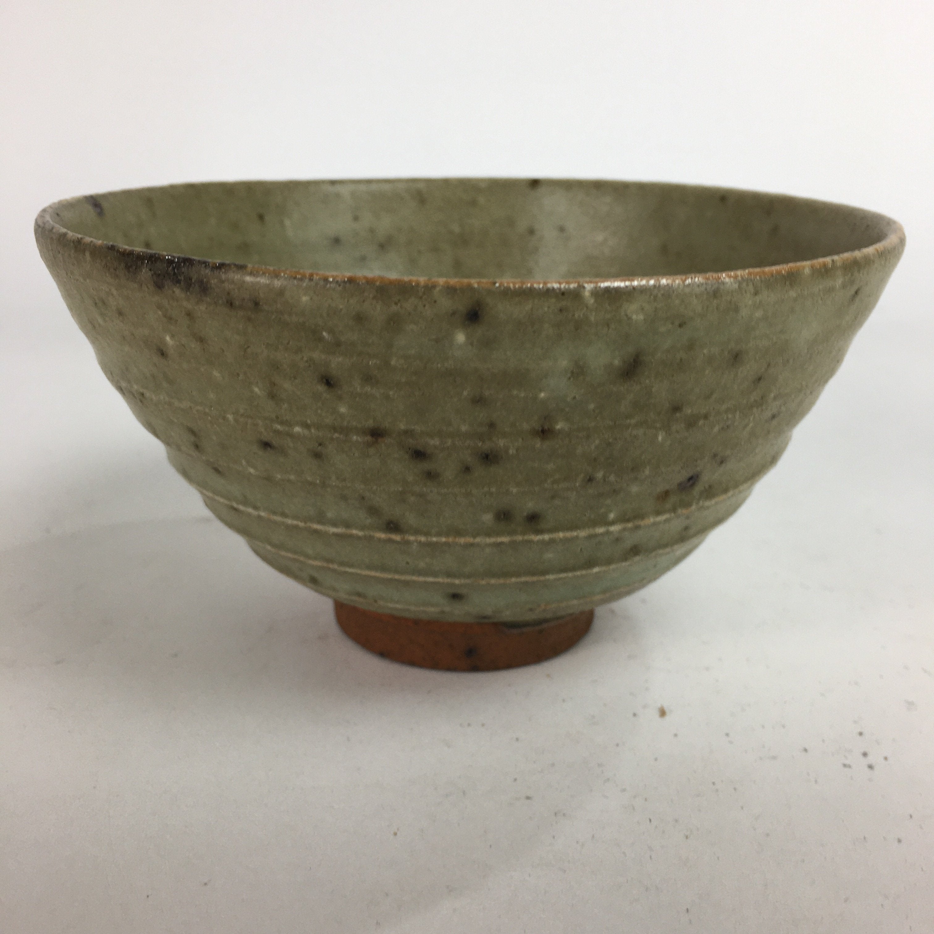https://chidorivintage.com/cdn/shop/products/Japanese-Vtg-Ceramic-Tea-Ceremony-Bowl-Chawan-Brown-Striped-Pattern-Pottery-GTB7_22ce4c0c-e478-4344-8904-d1a084534bae.jpg?v=1629529072